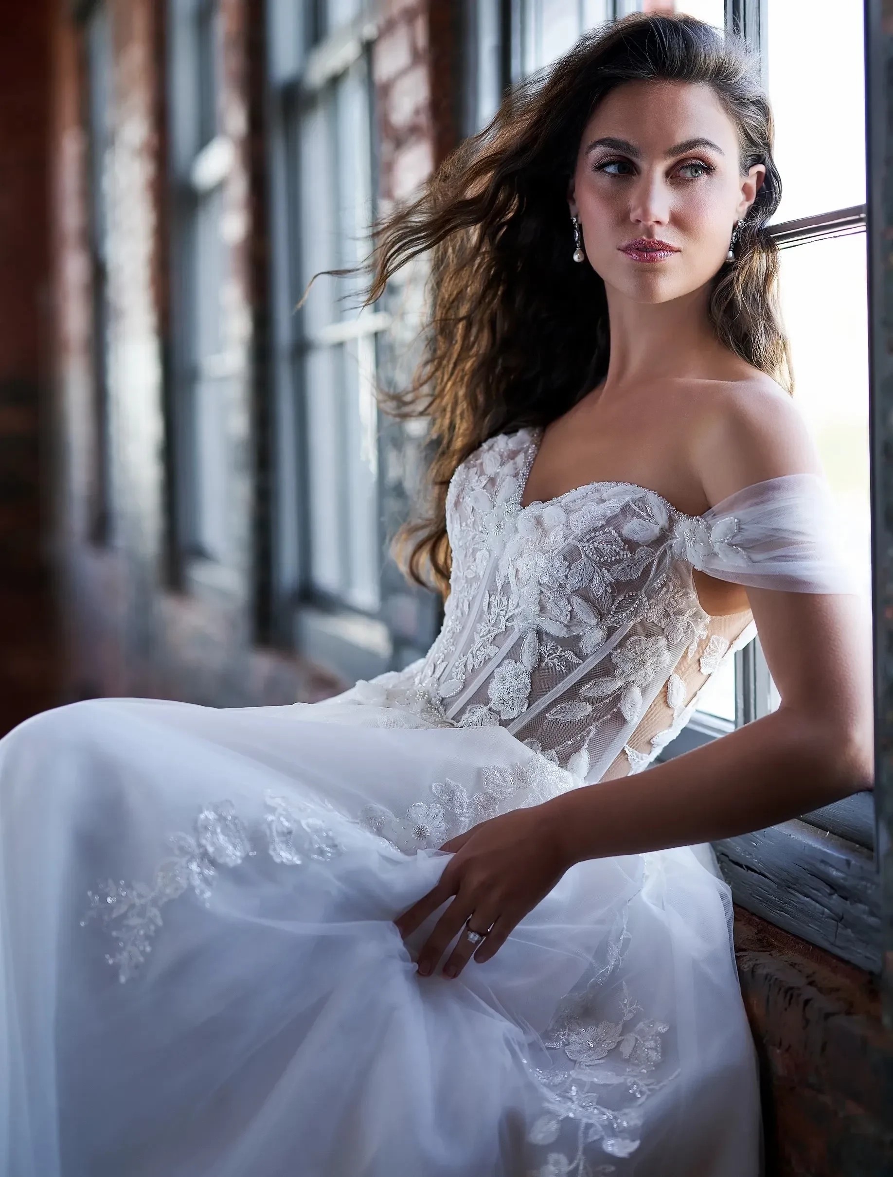 Photo of model wearing a Christina Wu Brides gown