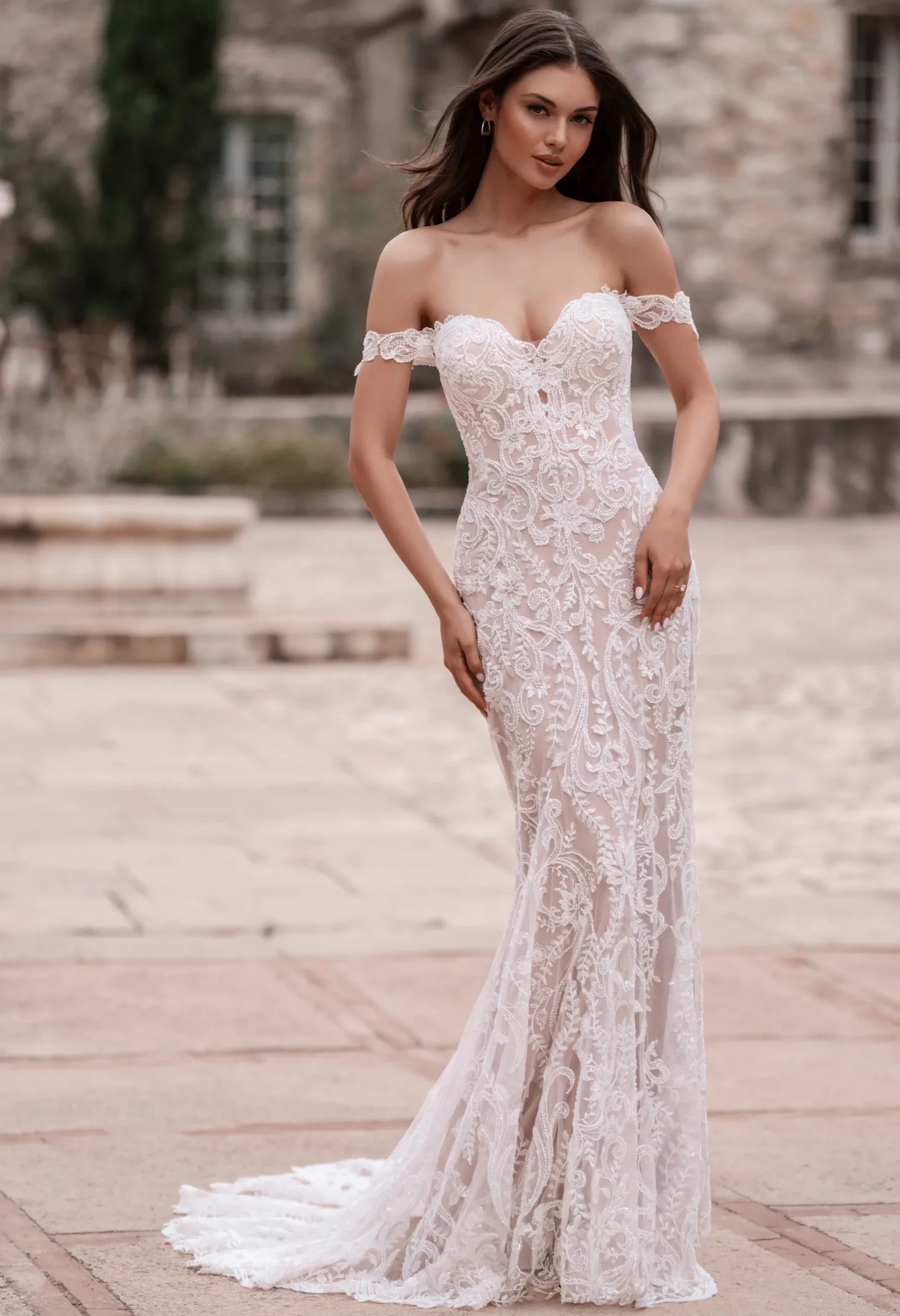 Photo of model wearing a Allure Bridals' gown