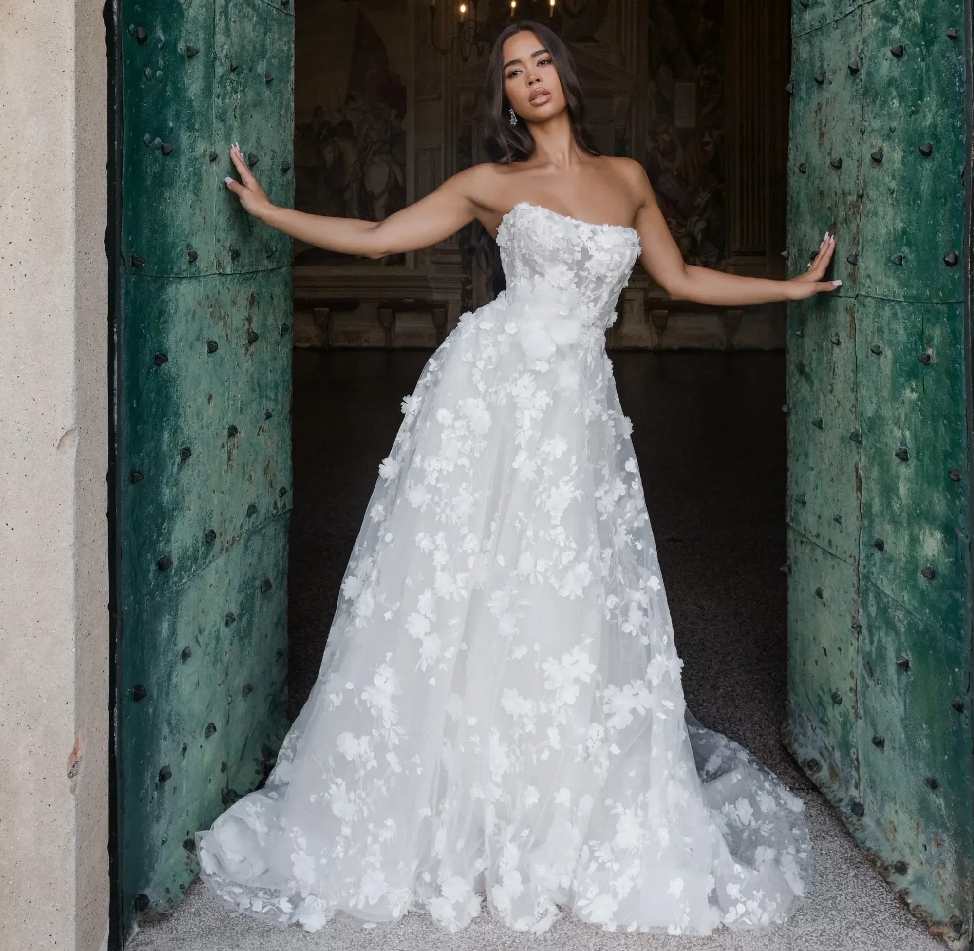Photo of model wearing a Abella bridal gown